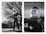 Black & white diptych of a giant sculpture of a 60's era astronaut figure with a rocket cone shaped helped holding a rocket with both hands.  The rocket says "Launching Pad" and the pedestal of the statue says "Gemini Giant". The left photo is the full figure with a tree in the immediate background and houses in the far background, giving the statue a sense of scale (about two stories tall). The right image is a close up of the helmeted face and the back of the rocket which shows an USA flag.